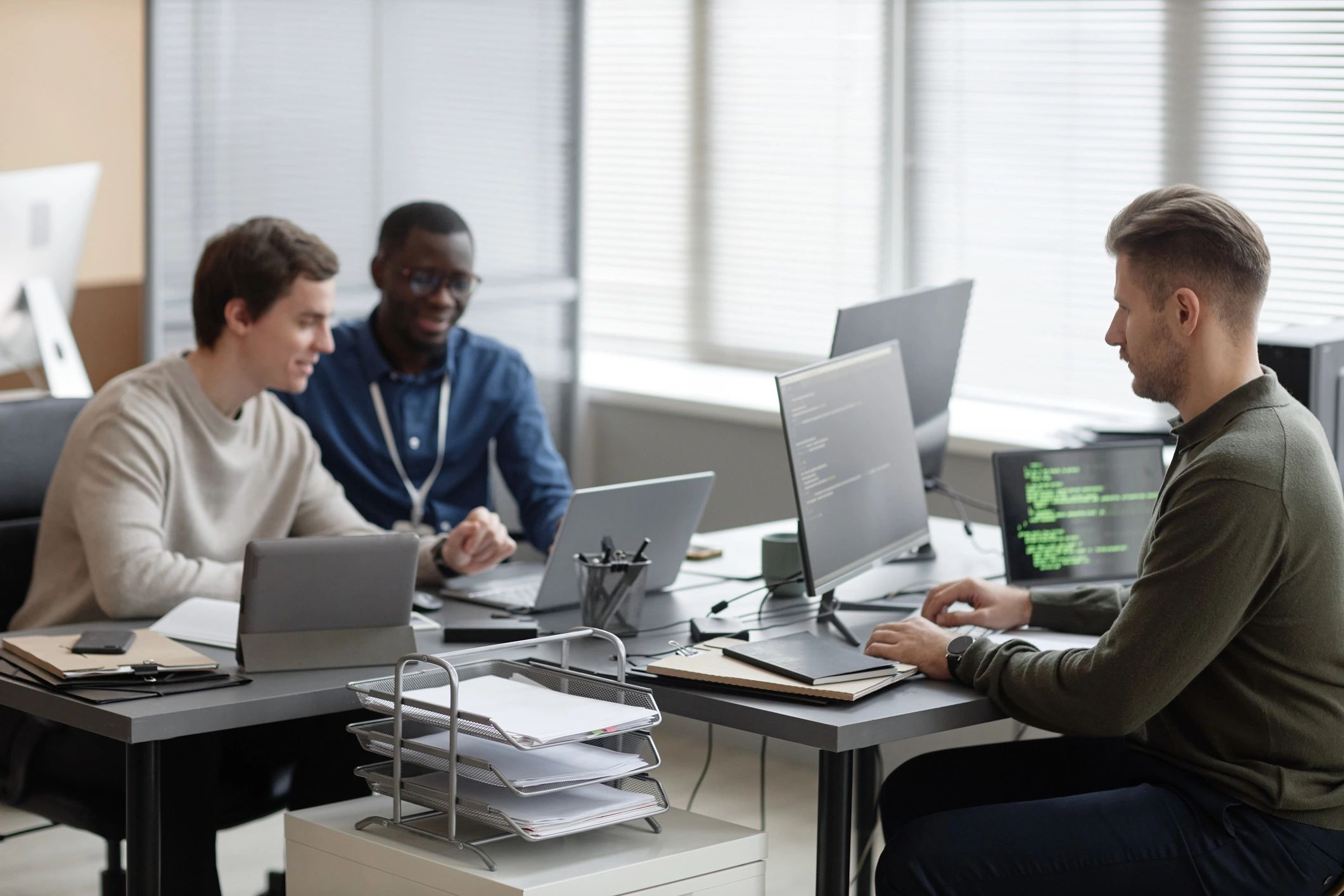 IT professionals collaborating in an office